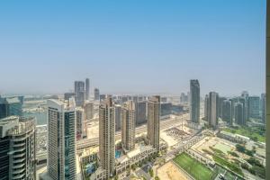 Nespecifikovaný výhled na destinaci Dubaj nebo výhled na město při pohledu z apartmánu
