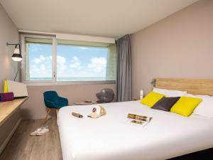 Postel nebo postele na pokoji v ubytování ibis Thalassa Le Touquet