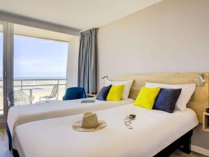 Postel nebo postele na pokoji v ubytování ibis Thalassa Le Touquet