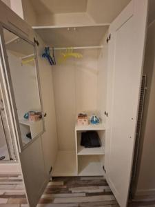 a bathroom with a walk in shower and a walk in closet at Room 505 - Eindhoven - By T&S in Eindhoven +1 photo