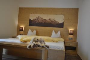 Postel nebo postele na pokoji v ubytování B&B - Apartments Sunnwies + 37 fotografií
