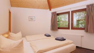 Postel nebo postele na pokoji v ubytování Hotel Residenz WALDOASE