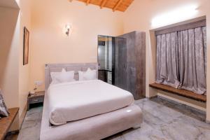 Letto o letti in una camera di Freesia Resort by Express Inn