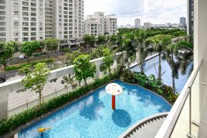 a view of the pool from the balcony of a apartment at Royal State - The Ascentia Phu My Hung in Ho Chi Minh City