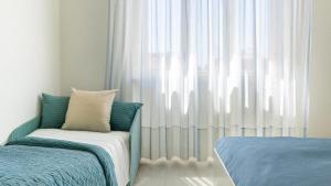 Posteľ alebo postele v izbe v ubytovaní Hotel Il Telamonio