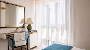 Posteľ alebo postele v izbe v ubytovaní Hotel Il Telamonio