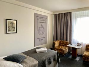Posteľ alebo postele v izbe v ubytovaní A-Austerlitz Hotel