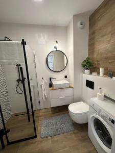 Koupelna v ubytování SkyTravel 27 Apartament Pileckiego Nowy Dwór Mazowiecki Airport Modlin 24H