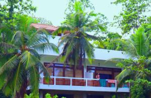 Balkón nebo terasa v ubytování CoCoSuRf House, Luxury among palms