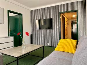 Televízia a/alebo spoločenská miestnosť v ubytovaní A-Austerlitz Hotel