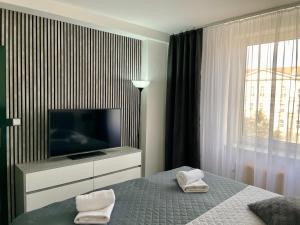 Posteľ alebo postele v izbe v ubytovaní A-Austerlitz Hotel