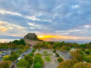 an aerial view of a mountain with a parking lot at Arcadion Hotel in Corfu Town