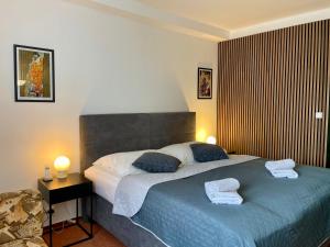 Posteľ alebo postele v izbe v ubytovaní A-Austerlitz Hotel