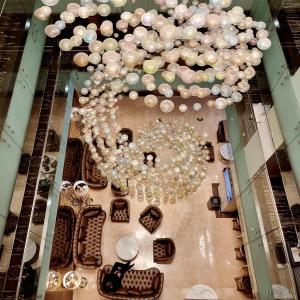 a large chandelier hanging from the ceiling in a store at Port Bosphorus Hotel in Istanbul