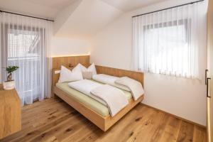 Posteľ alebo postele v izbe v ubytovaní Zum Sonnentor App Pinus