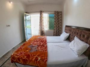 Postel nebo postele na pokoji v ubytování Karma Hostel
