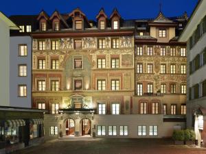 a large building with a lot of windows at Hotel des Balances in Lucerne