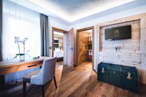 Ein Sitzbereich in der Unterkunft Hotel Klosterbräu