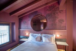 Postel nebo postele na pokoji v ubytování Albergo La Braseria