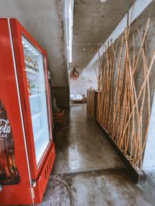 a hallway in a building with a bunch of wood at Hotel Puerto Chinchorro in Arica