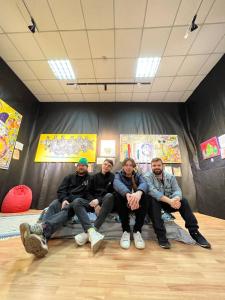 a group of men sitting in a room at АРТ-ВОКЗАЛ in Kryvyi Rih