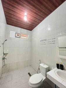 Ванна кімната в Vila Nio