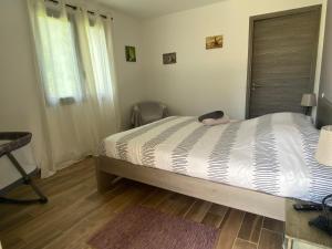 Ένα ή περισσότερα κρεβάτια σε δωμάτιο στο Terra bella Costa Verde T2 classé 3 étoiles