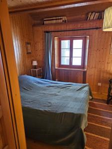 Łóżko lub łóżka w pokoju w obiekcie L'ancien hospice