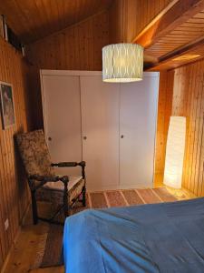 Łóżko lub łóżka w pokoju w obiekcie L'ancien hospice