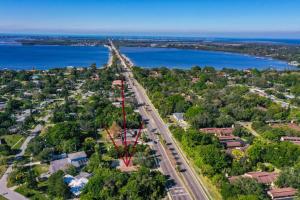 an aerial view of a city and the water at Lazy Manatee Pool Home in Bradenton