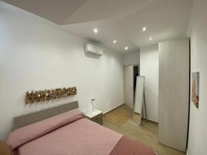 מיטה או מיטות בחדר ב-Casa Antinoro