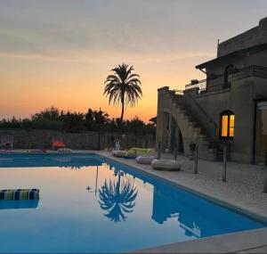 The swimming pool at or close to Villa Panagias tis Loreto