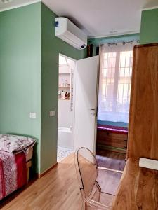 A bed or beds in a room at 2 Via Fabio Mangone