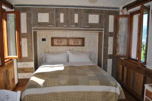 Postel nebo postele na pokoji v ubytování B&B Il Torchio