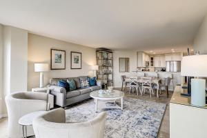 a living room with a couch and a table at Sea Cloisters 409 in Hilton Head Island