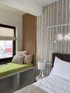 En eller flere senge i et værelse på Nivalis Residence 6