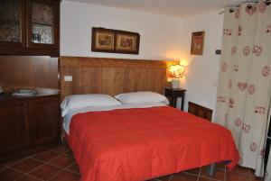 Katil atau katil-katil dalam bilik di B&B Il Torchio