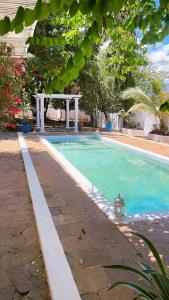 a swimming pool in a yard with at Killi Luxury Villa in Moshi