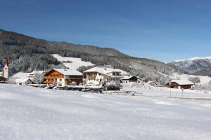 L'établissement Astor Apartments en hiver