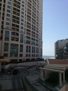 a view of a city with tall buildings at Apartment at 4 Seasonz San Stefano in Alexandria