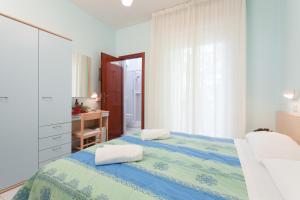 Krevet ili kreveti u jedinici u objektu Hotel Santa Martina