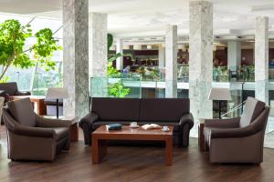 a lobby with two couches and a coffee table at Hotel Best Tenerife in Playa de las Americas
