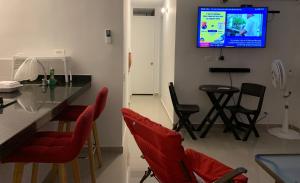 TV i/ili multimedijalni sistem u objektu Apartamento - Tocaima
