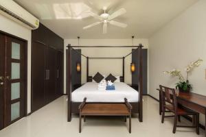 Postel nebo postele na pokoji v ubytování Villa Flores by Tropiclook