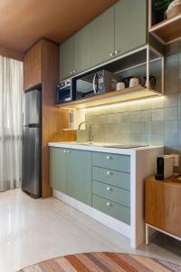 Virtuvė arba virtuvėlė apgyvendinimo įstaigoje Studio Bali