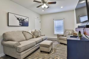 a living room with a couch and a ceiling fan at M20 Rentals Modern Apartment 2bd 1ba Centrally Located Salem, NH in Salem