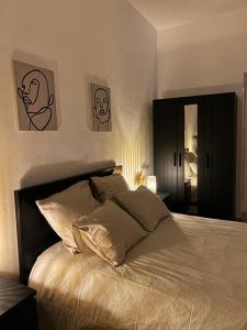 Voodi või voodid majutusasutuse Laeken : Cocon Chaleureux & Confort toas