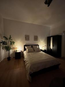 Voodi või voodid majutusasutuse Laeken : Cocon Chaleureux & Confort toas