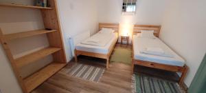 Posteľ alebo postele v izbe v ubytovaní Zrínyi 11 Apartments