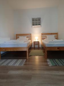 Posteľ alebo postele v izbe v ubytovaní Zrínyi 11 Apartments
